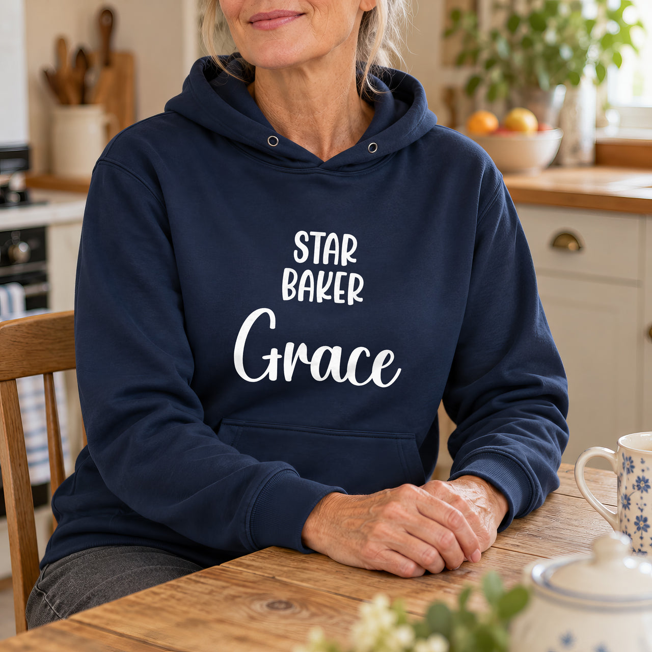 Star Baker Iron-On Transfer - Personalised Name Design, shown on a navy hoodie