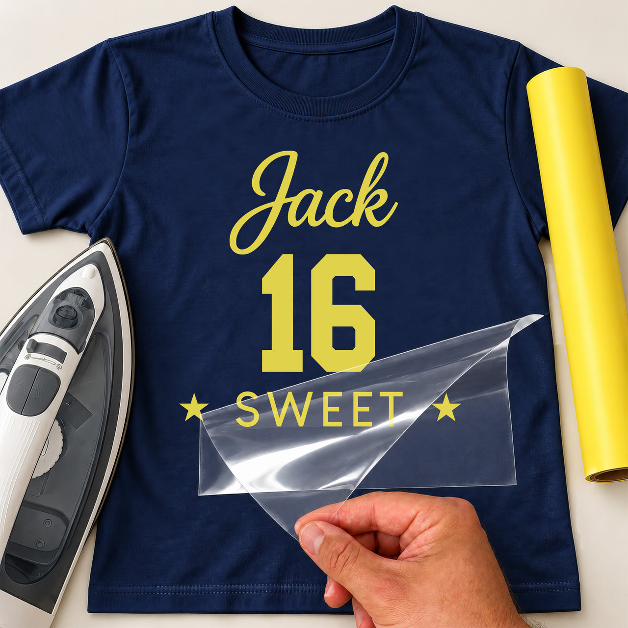 Navy T-shirt with yellow 'Jack' script, varsity '16' and 'SWEET' between stars, iron-on transfer, iron and yellow vinyl roll
