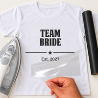 White T-shirt with black 'TEAM BRIDE', star divider and 'Est. 2027', hen party varsity iron-on transfer