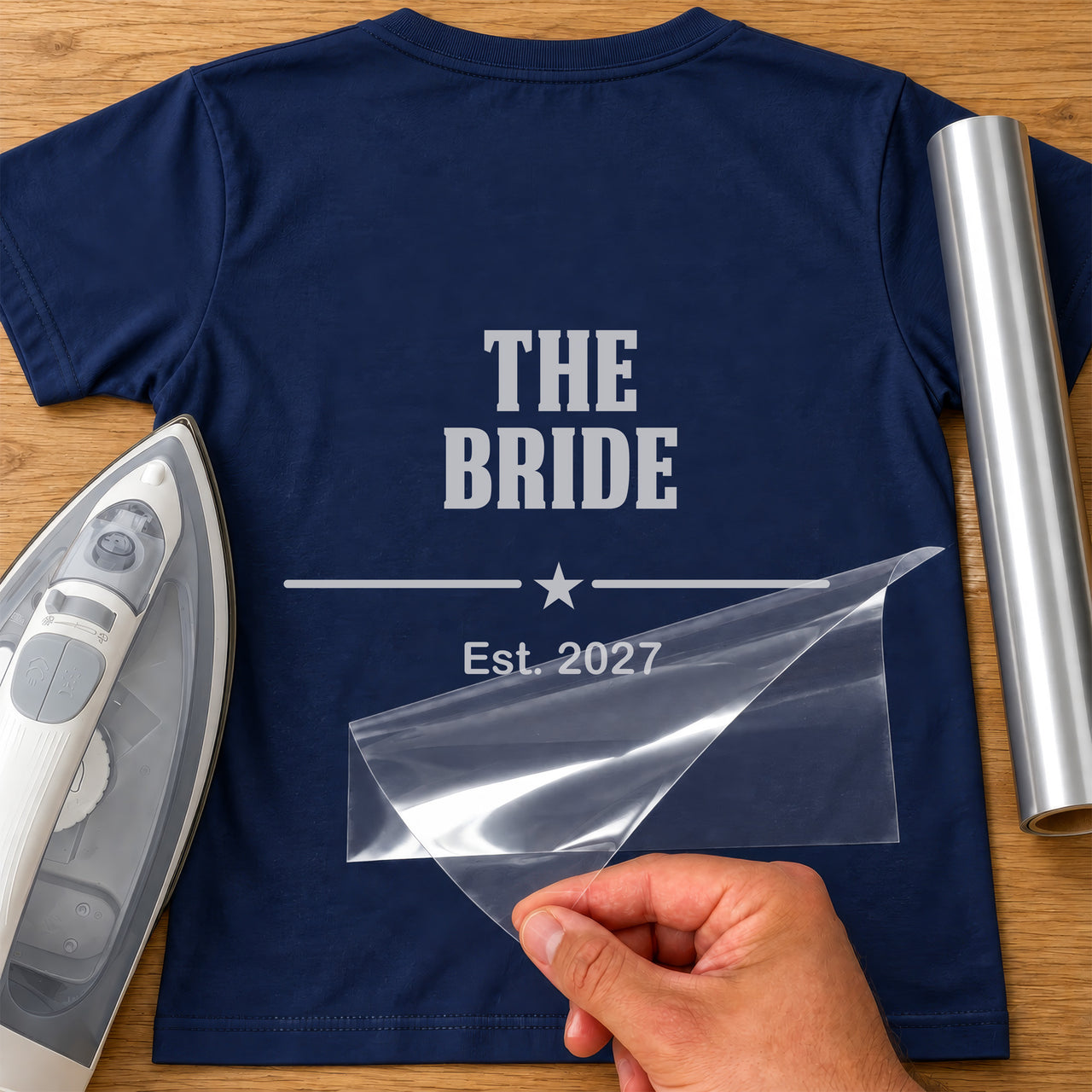 Navy T-shirt back with silver 'THE BRIDE', star divider and 'Est. 2027', varsity iron-on transfer