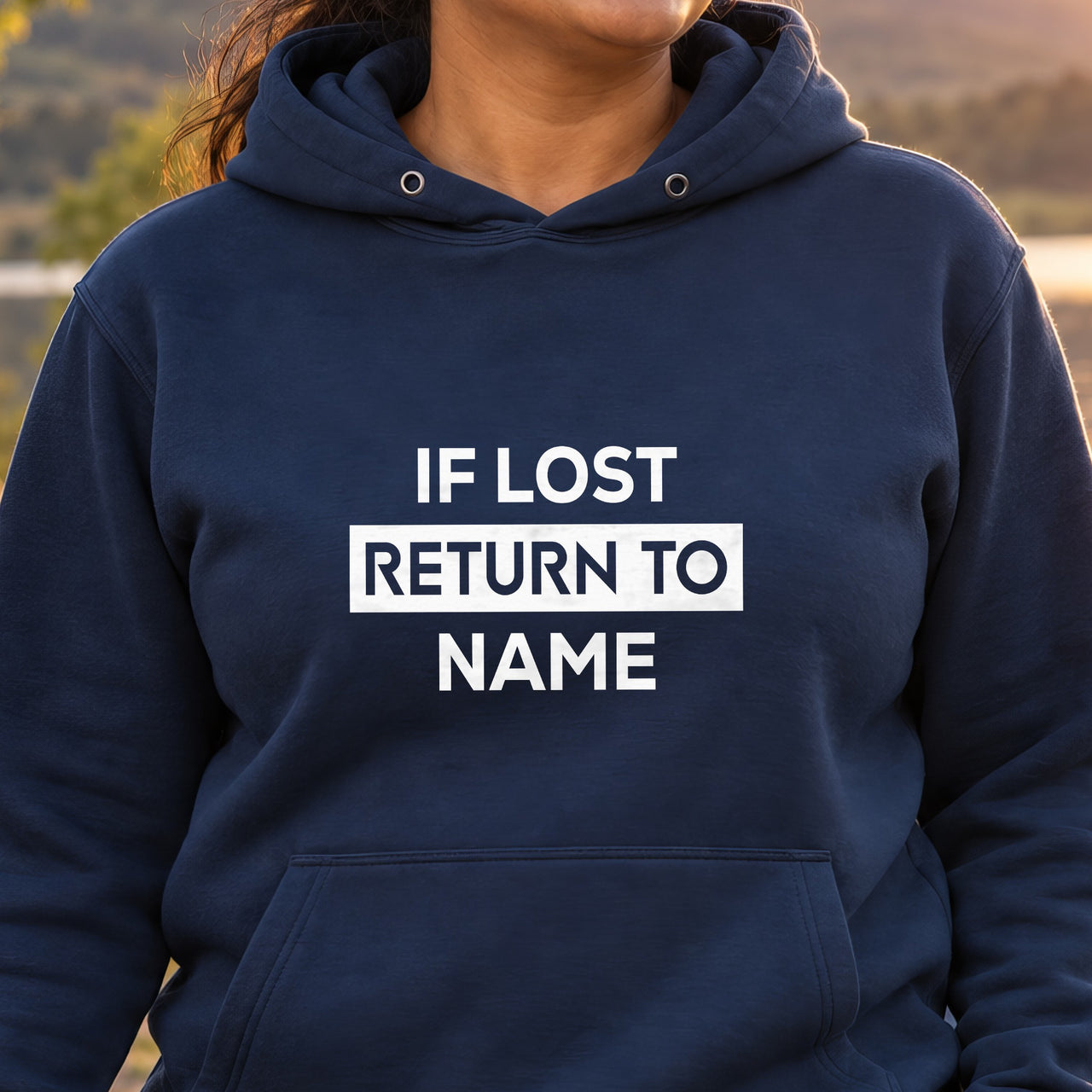 If lost return to name on a navy hoodie