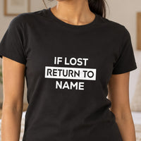 If lost return to name on a black T-shirt