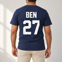 Navy T-shirt with the Training Kit Name and Number design printed on the back