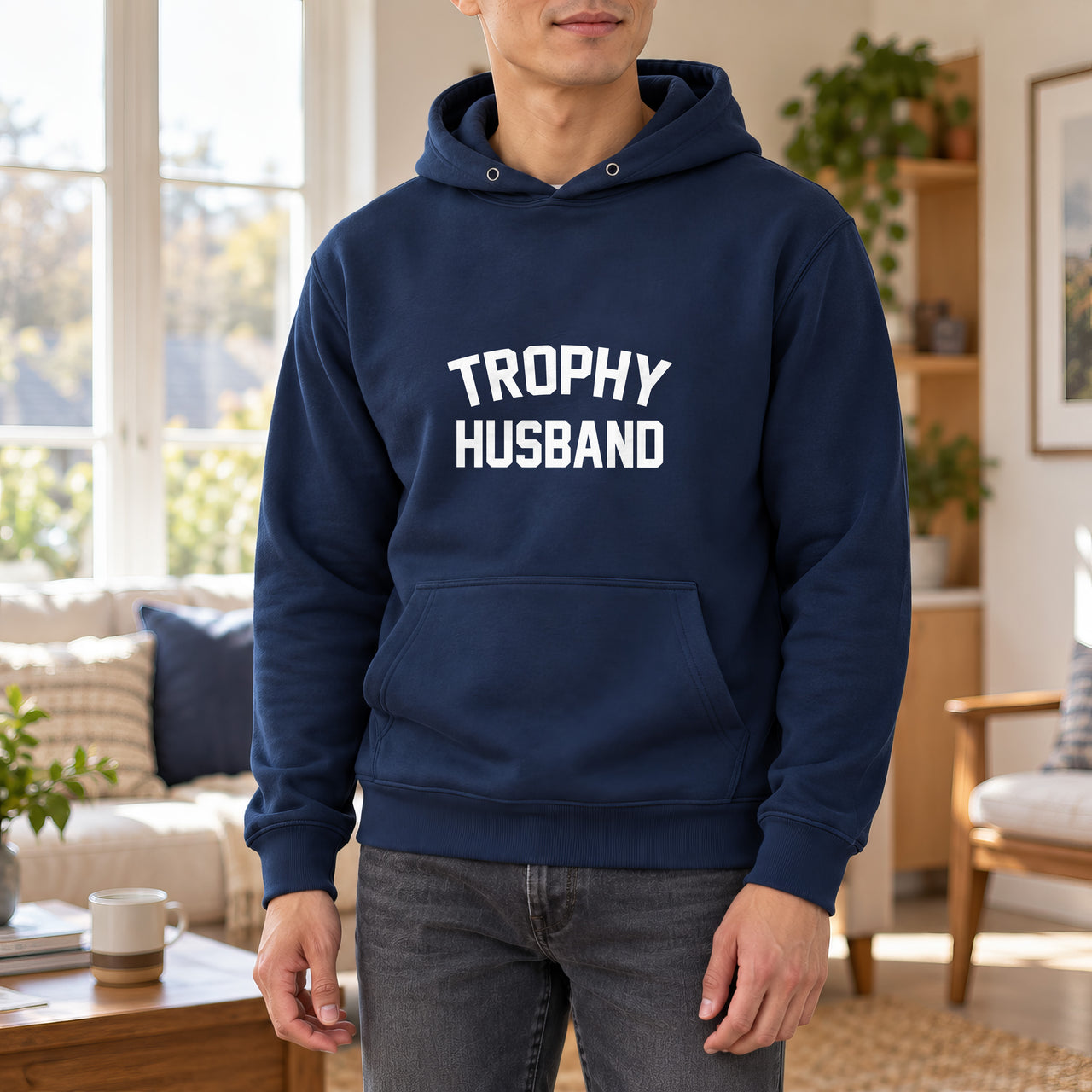 Navy hoodie with the Trophy Husband design printed on the chest