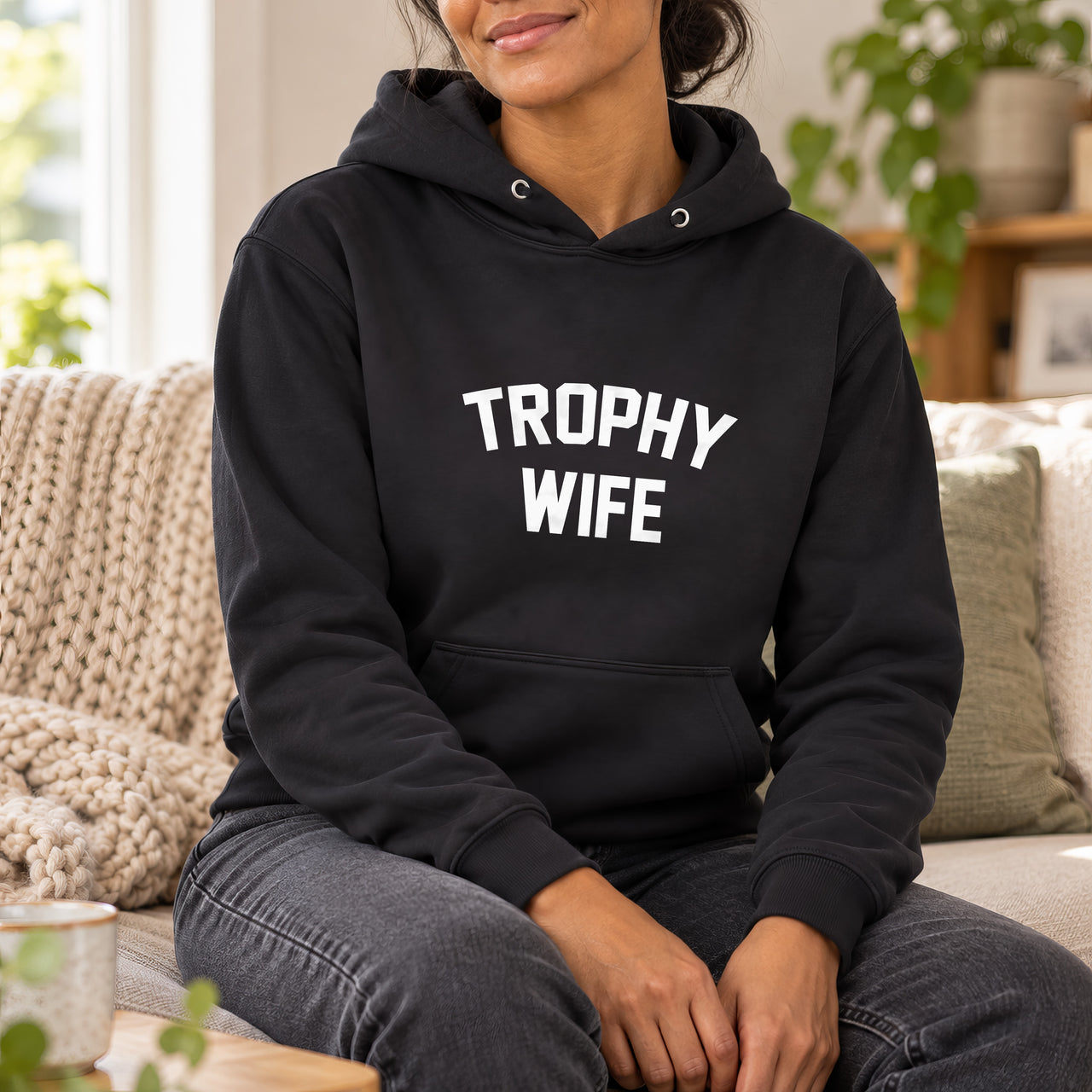 Black hoodie with the Trophy Wife design printed on the chest