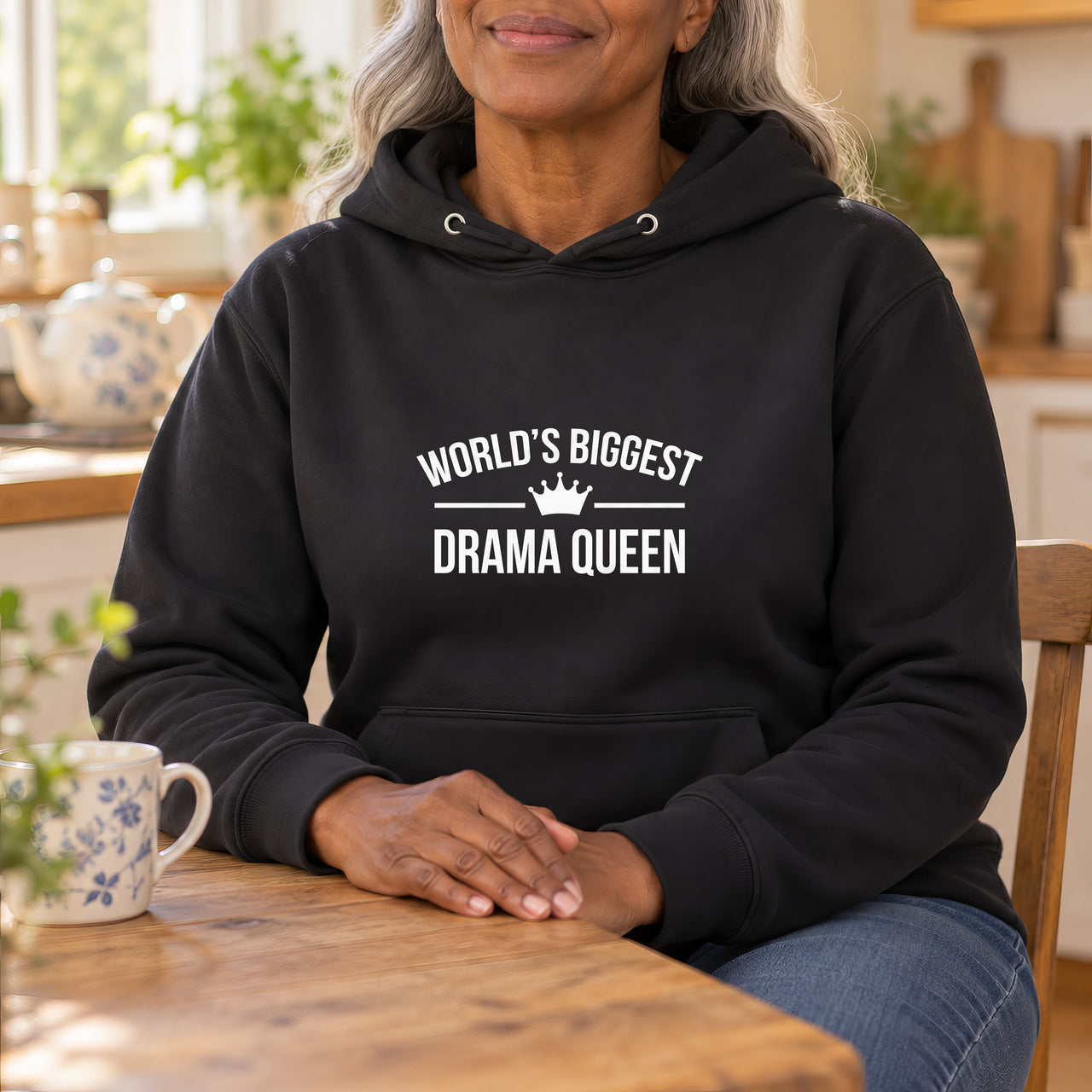 World's Biggest Drama Queen Iron-On Transfer, shown on a black hoodie