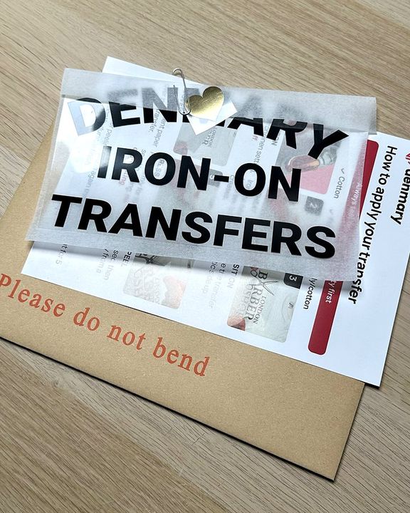 The flat DENMARY iron-on transfers envelope the order comes in